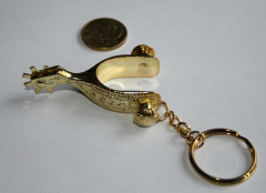 Schlüsselanhänger Sporen gold