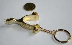 Schlüsselanhänger Sporen gold